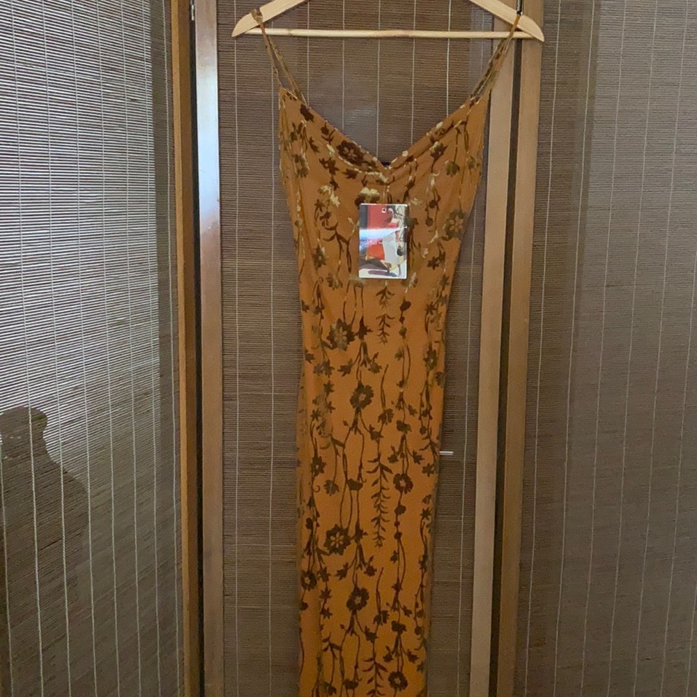Naked Wardrobe sleeveless stretchy materiall